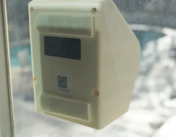 Airnote mounted on an exterior window
